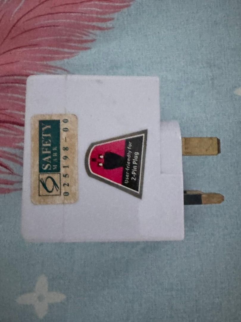 Universal Plug Adapter (Category: Electrical, Adaptors & Sockets) located in Singapore. Submitted by lenin_sg (Listing ID 1389333311, Image 1). Description: - Universal plug adapter - Compatible with various plug types - Easy to use with 2-pin plugs - Fused design for safety - In good working condition.
