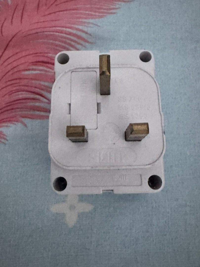 Universal Plug Adapter (Category: Electrical, Adaptors & Sockets) located in Singapore. Submitted by lenin_sg (Listing ID 1389333311, Image 3). Description: - Universal plug adapter - Compatible with various plug types - Easy to use with 2-pin plugs - Fused design for safety - In good working condition.