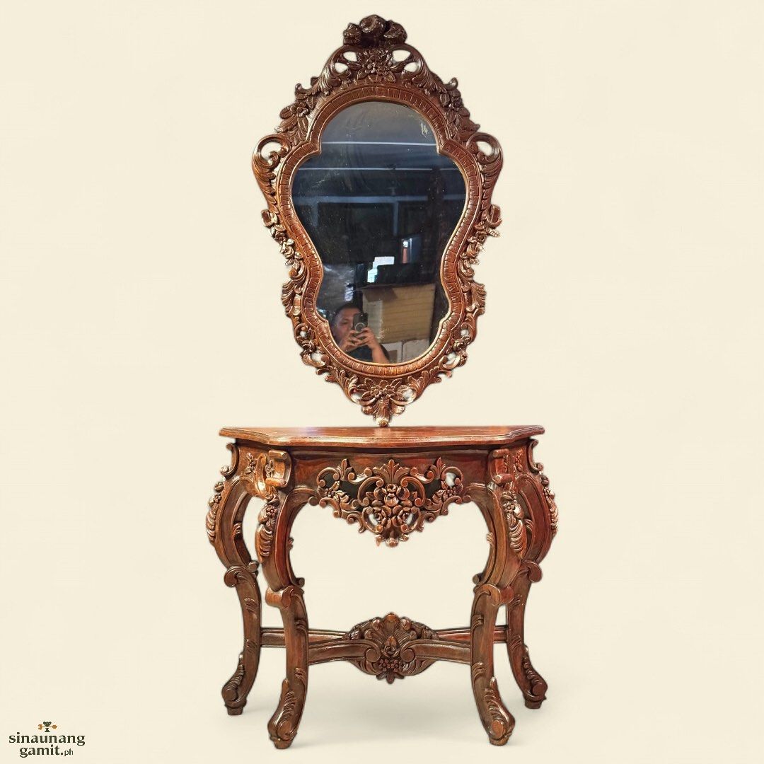 Vintage Victorian Narra Console Table with Mirror (Category: Tables & Sets) located in Manila. Submitted by sinaunang_gamit (Listing ID 1389437348, Image 1). Description: Vintage Victorian Narra Console Table with Mirror Mirror height: 43 inches Table height: 31 inches Table Length: 39 inches Table width: 16 inches 15k for the set.