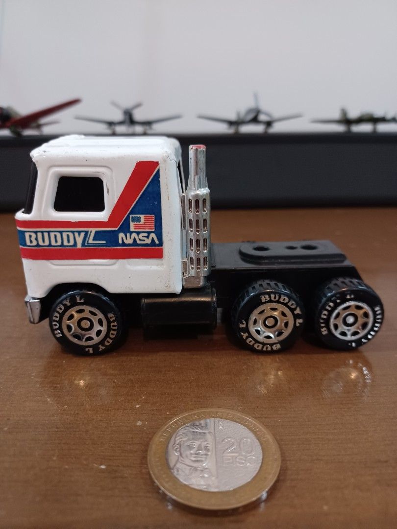 1980 Buddy L NASA Space Shuttle Mack Tractor - Cab Only (Category: Vehicle & Diecast Models) located in Quezon City. Submitted by daned05 (Listing ID 1389502746, Image 1). Description: Vintage 1980 Buddy L NASA Space Shuttle Mack Tractor - Cab Only No Trailer Buddy L was a classic American toy brand known for its heavy-duty steel trucks, first introduced in the 1920s. The brand changed ownership several times over the years and still exists today