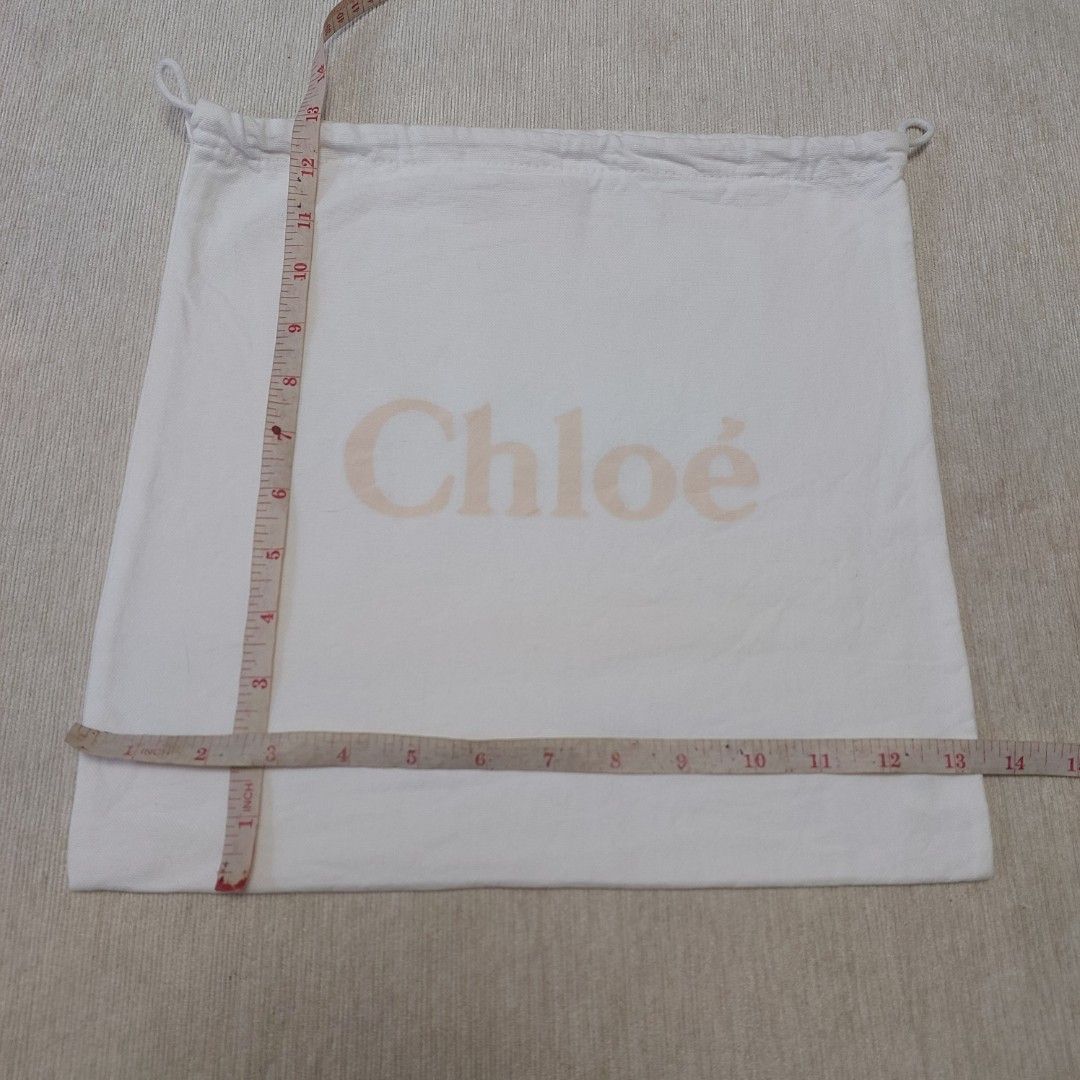 Authentic Chloe dust bag 13x13 inches (Category: Luxury Bags & Wallets) located in Manila. Submitted by jfluxury.co (Listing ID 1389646280, Image 3). Description: excellent condition no flaws bought in Japan 🇯🇵 💯% Authentic. 😊 Money back guarantee. 😊 Clean and ready to use na..
