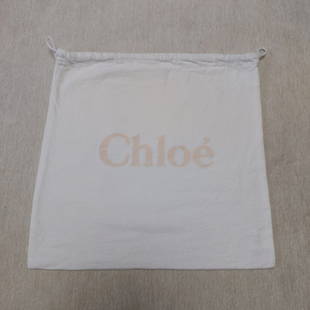 Authentic Chloe dust bag 13x13 inches (Category: Luxury Bags & Wallets) located in Manila. Submitted by jfluxury.co (Listing ID 1389646280, Image 2). Description: excellent condition no flaws bought in Japan 🇯🇵 💯% Authentic. 😊 Money back guarantee. 😊 Clean and ready to use na..