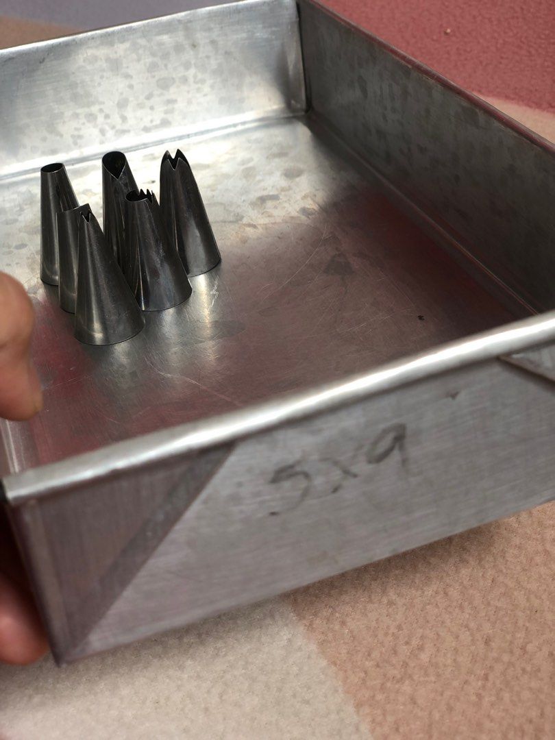 Baking Pan and Piping Tips (Category: Bakeware) located in General Trias. Submitted by previouslyadored147 (Listing ID 1389622302, Image 2). Description: 5x9 - 1 pc baking pan 6 pcs piping tips Free for a minimum purchase of Php 300..