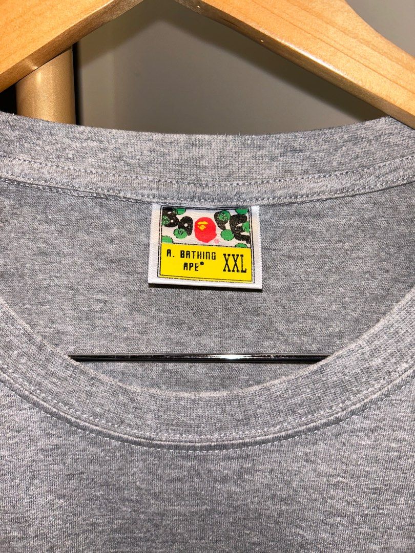 Bape T shirt (Category: Tshirts & Polo Shirts ) located in Quezon City. Submitted by darrenasiddao (Listing ID 1389557802, Image 2). Description: Plain Bape Gray Shirt Excellent Condition Size 26.5 x 20 Negotiable.