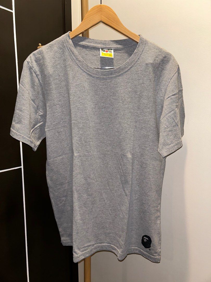 Bape T shirt (Category: Tshirts & Polo Shirts ) located in Quezon City. Submitted by darrenasiddao (Listing ID 1389557802, Image 1). Description: Plain Bape Gray Shirt Excellent Condition Size 26.5 x 20 Negotiable.