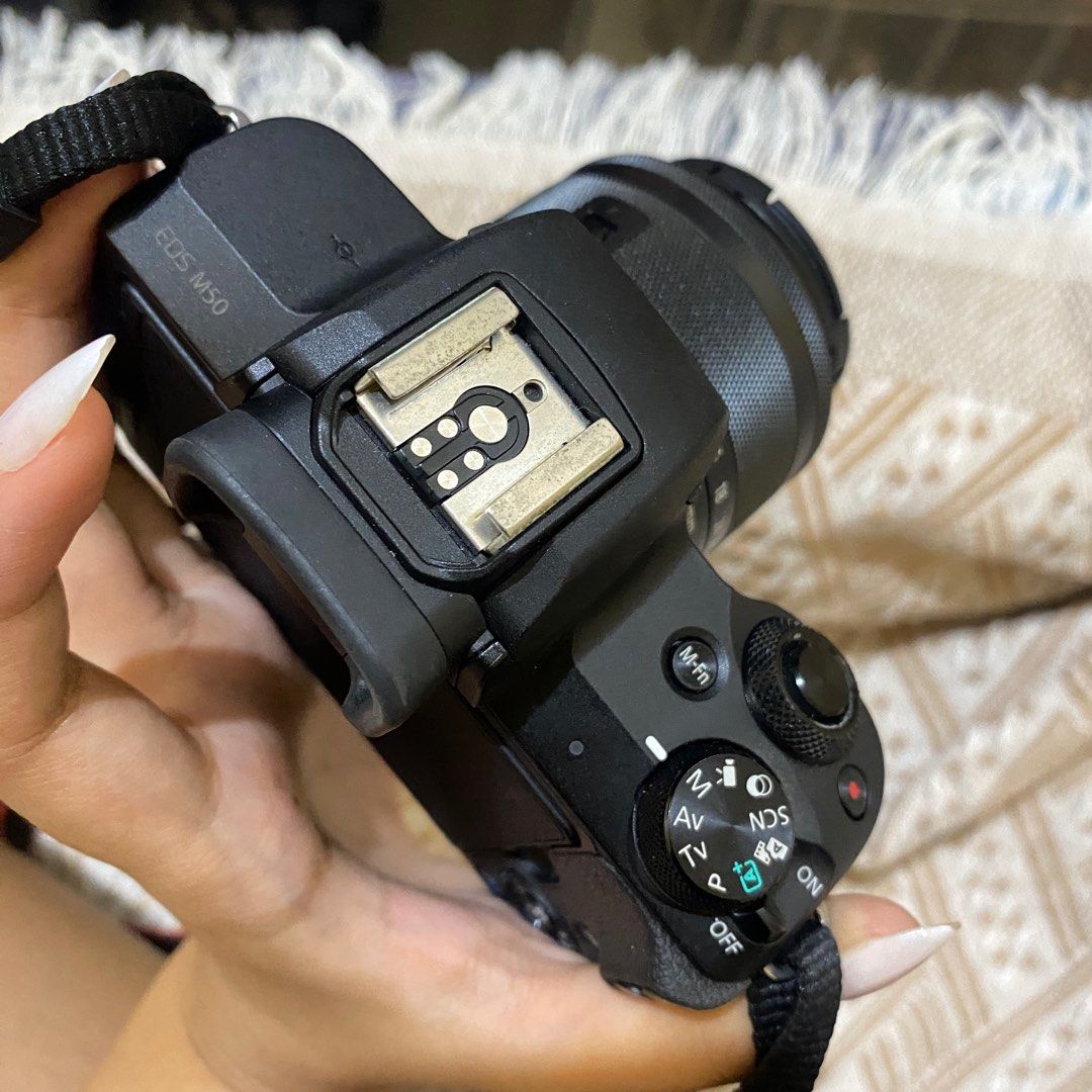Canon EOS M50 with 15-45mm kitlens (Category: Cameras) located in Quezon City. Submitted by jelly_fres (Listing ID 1389512752, Image 3). Description: Issue: 1. small dots on viewfinder (check last photo, output not affected) 2. nangangalawang na hot shoe (check 3rd photo) Overall 9/10, no issue sa output. Once again, NO ISSUE SA OUTPUT. Smooth pa rin gamitin. GUMAGANA LAHAT NG BUTTONS, INCLUDING FLASH Inclusions: M50 body 15-45mm kitlens Charger 