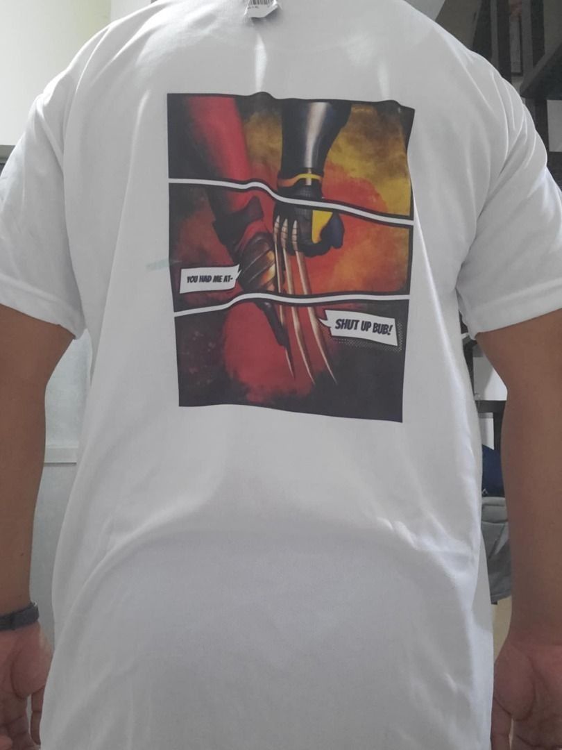 Deadpool & Wolverine Logo White Drifit Shirt (Category: Activewear) located in Manila. Submitted by mwnadala (Listing ID 1367669331, Image 3). Description: Color: White Size: Large, 2XL, 3XL Make:Dri-Fit Condition: New Reason for Selling: n/a Meet Up Location: Kalentong or LRT 2 V. Mapa Station Issues: None.