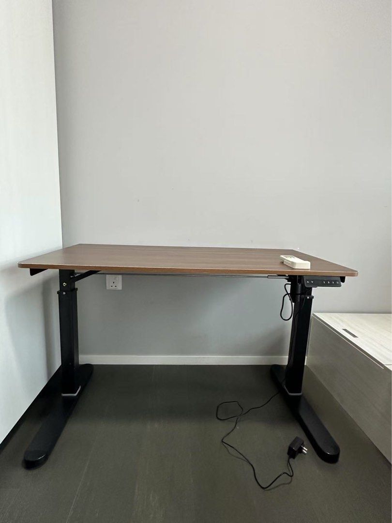 Electronically adjustable study desk (Category: Tables & Sets) located in Singapore. Submitted by fionasgsg (Listing ID 1389544077, Image 3). Description: - 120cm width * 71-118cm height - bought it a year ago, still covered under 5-year warranty - electronically adjusted .