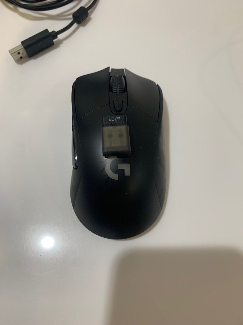 Logitech 703 Lightspeed (Category: Mouse & Mousepads) located in Manila. Submitted by monkeybananas (Listing ID 1389584408, Image 1). Description: - authentic - damaged scroll wheel - 📍location, San Juan City - 🚛 delivery service grab and lalamove.
