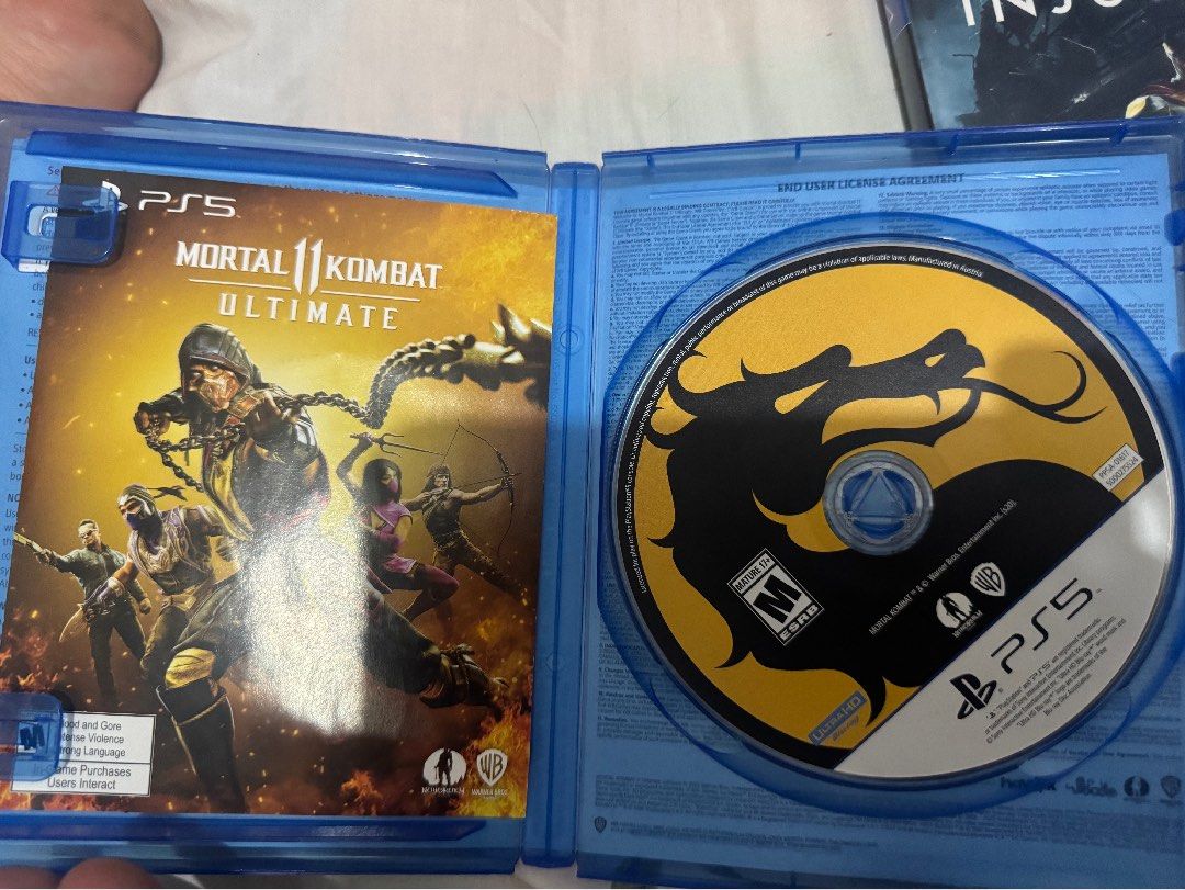 Mortal kombat 11 and injustice 2 (Category: PlayStation) located in Bacolod City. Submitted by swagspot (Listing ID 1389632309, Image 2). Description: Ps4 compatible to ps5 mortal kombat with code no issue good as new.