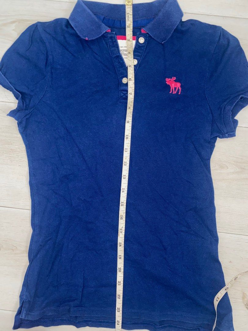 Preppy Navy Blue Collared Shirt (Category: Shirts) located in Cavite. Submitted by bbbb444 (Listing ID 1389507771, Image 3). Description: thrifted ! so pls manage ur expectations ! :) tag says M but this can fit xs-s NO WW PHOTOS! .