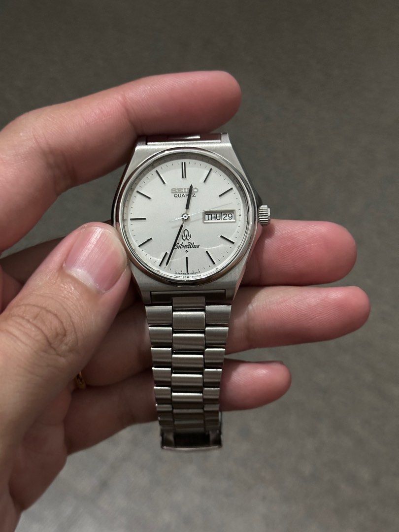 Seiko Silver Wave 8229-8000 (Category: Men's Watches) located in Bulacan. Submitted by fitloop_ph (Listing ID 1389511310, Image 3). Description: Seiko Quartz SilverWave-Brushed Silver dial • Model: 8229-8000 • Case Size: 37 mm Diameter • Lug-to-Lug: Approx. 41 mm • Dial: Brushed Silver Dial with Black Indices • Bracelet: Original Integrated Stainless Steel • Day-Date: English/Kanji • Caseback: Stainless steel .