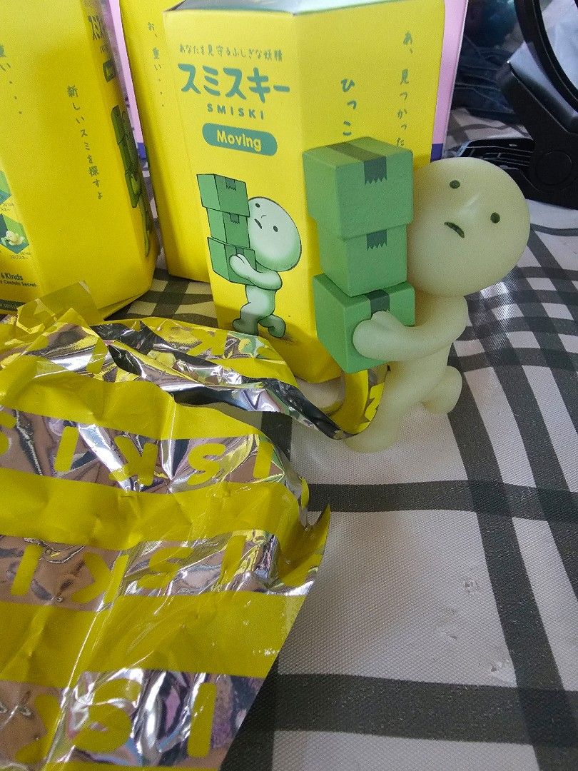 Smiski glow in the dark mini figure moving series [smiski balancing boxes, carrying ladder, falling down] (Category: Designer & Blind Box Toys) located in Las Pinas. Submitted by gl3nndita (Listing ID 1389551017, Image 1). Description: Dreams Original Open box, with foil, open foil, with leaflet Available: Balancing boxes Carrying ladder Falling down Green thumb - sold.