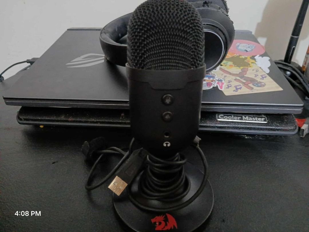 Streaming & Gaming Bundle – Redragon Mic + Awei Headset (Good Condition!) (Category: Headphones & Headsets) located in Makati City. Submitted by sellaton3000 (Listing ID 1389576047, Image 3). Description: “Bundle deal": Redragon GM303 + Awei A200BL, both in good condition Works clear and ready to use." Payment Options: Gcash GoTyme Cash Delivery Options: Lalamove LBC Meetup (Within Metro Manila) *Note: Headphone leather is tearing off.