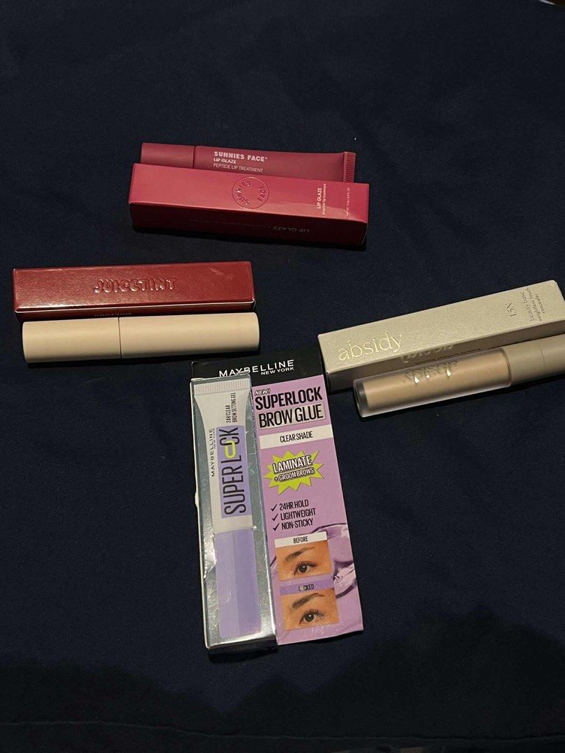 Sunnies Face, Absidy, Maybelline (Category: Makeup) located in Macabebe. Submitted by kurtconcepcion18 (Listing ID 1389639465, Image 1). Description: sunnies peptide lip treatment (sour plum) sunnies face juice tint (gem) absidy concealer (1.5N) maybelline brow glue (clear) take all for 1300 +sf all bnew.
