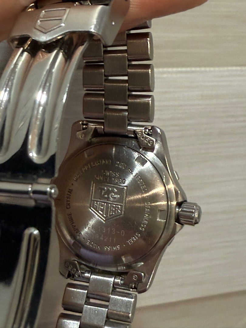 Tag Heuer WK1313 Quartz 28mm (Category: Luxury Watches) located in Manila. Submitted by preloved.jp (Listing ID 1389664378, Image 2). Description: Authentic Tag Heuer WK1313 Quartz Battery 28mm Stainless steel 15cm wrist size No extra link Watch only .