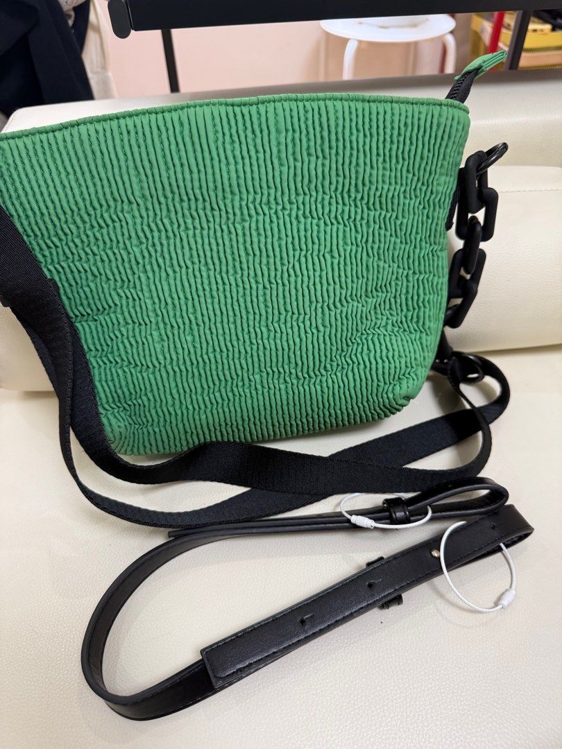 Urban Revivo Pleated Bag (Category: Cross-body Bags) located in Pasay City. Submitted by mcsanmig (Listing ID 1389530803, Image 2). Description: Used twice No flaws With Dust bag and extra strap With pocket inside.