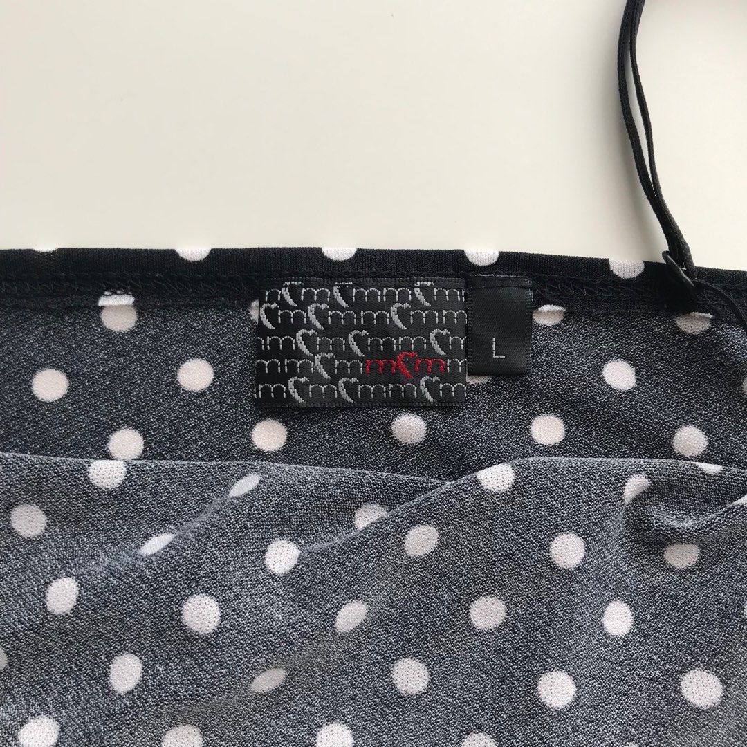 vintage polka dot ruffle sleeveless top (Category: Sleeveless) located in Marikina City. Submitted by naglr (Listing ID 1389550967, Image 2). Description: ✱ says L on tag but best fits S-M ✱ bought from an ig thrift shop but never worn ✱ has a minor flaw on strap but is still wearable ✱ no when worn photo for this item .