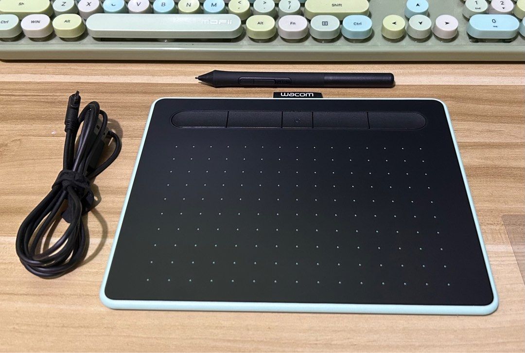 Wacom Intuos with Bluetooth CTL-4100WL Graphic Drawing Pen Tablet Small (Category: Other Accessories) located in Angono. Submitted by everythingpetite (Listing ID 1389532432, Image 1). Description: Wacom Intous Drawing Tablet Pistachio Green No Box (just the tablet, pen and cord) Bought last 7 June 2025 Used twice only as trial RFS: Bought it because I find it so cute hehe but I prefer the iPad Price: 5K MOP: BPI, BDO or GCash only Delivery: Book