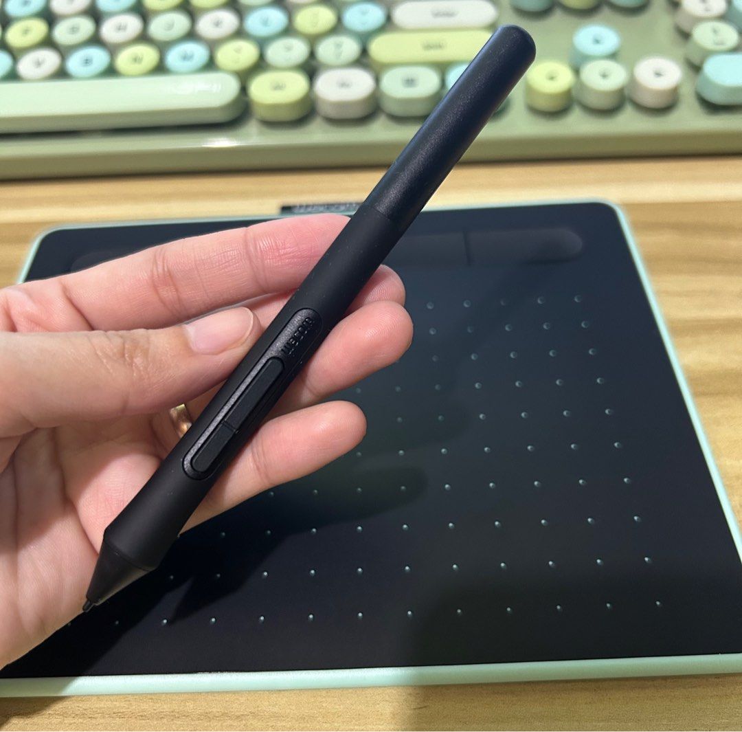 Wacom Intuos with Bluetooth CTL-4100WL Graphic Drawing Pen Tablet Small (Category: Other Accessories) located in Angono. Submitted by everythingpetite (Listing ID 1389532432, Image 3). Description: Wacom Intous Drawing Tablet Pistachio Green No Box (just the tablet, pen and cord) Bought last 7 June 2025 Used twice only as trial RFS: Bought it because I find it so cute hehe but I prefer the iPad Price: 5K MOP: BPI, BDO or GCash only Delivery: Book