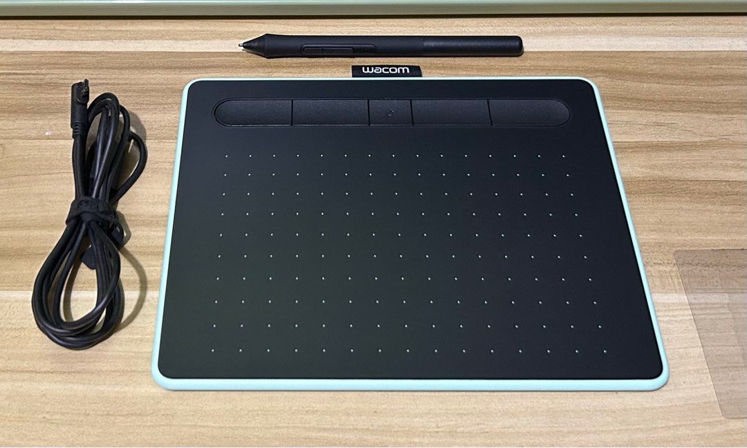Wacom Intuos with Bluetooth CTL-4100WL Graphic Drawing Pen Tablet Small (Category: Other Accessories) located in Angono. Submitted by everythingpetite (Listing ID 1389532432, Image 2). Description: Wacom Intous Drawing Tablet Pistachio Green No Box (just the tablet, pen and cord) Bought last 7 June 2025 Used twice only as trial RFS: Bought it because I find it so cute hehe but I prefer the iPad Price: 5K MOP: BPI, BDO or GCash only Delivery: Book