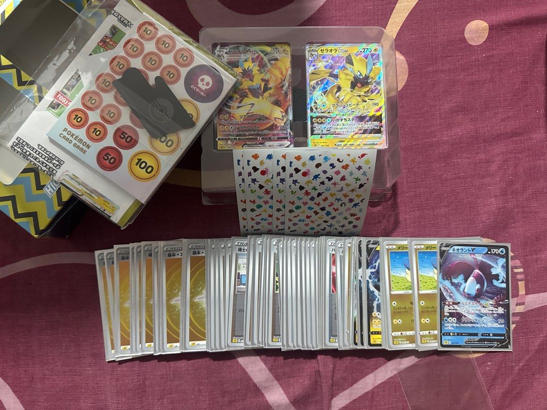 Zeraora Vstar and Vmax Classic Deck (Category: Raw Singles) located in Quezon City. Submitted by jayzz1 (Listing ID 1389661074, Image 3). Description: Selling my zeraora deck - JP decks (holo foil all 60 cards) - Includes 151 sleeves - NOT Sealed anymore Markers, Vstar marker, player guide are all in the box Can do VC for legit check QC Area for meetup Shipping shoulder ng buyer .