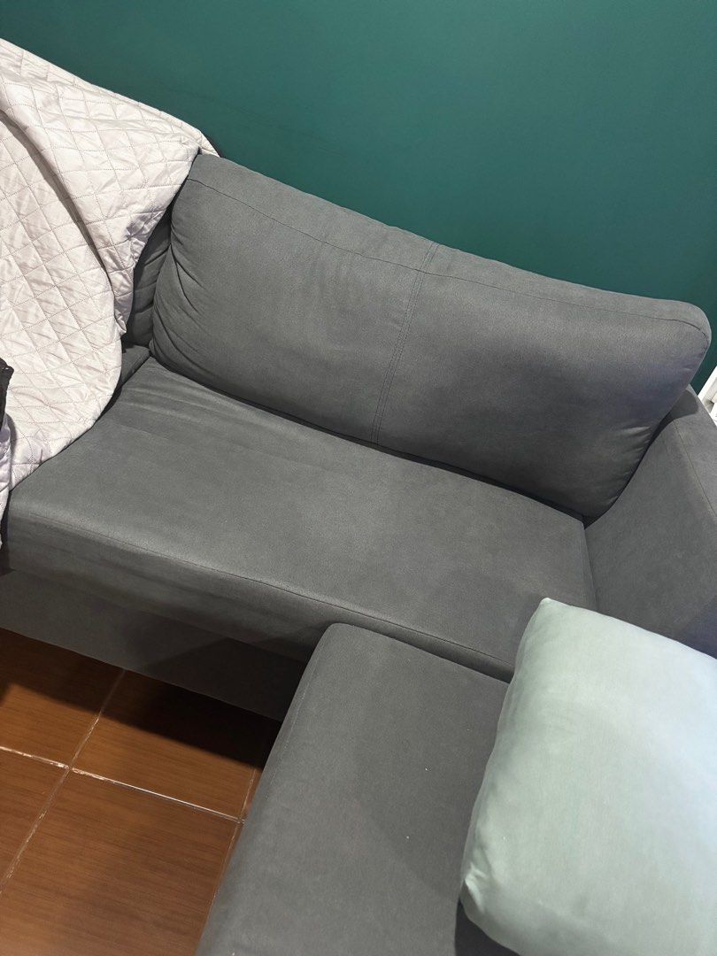 3 seater sofa with ottoman (Category: Sofas) located in Pasig City. Submitted by cathddm (Listing ID 1347316394, Image 3). Description: 3 seater sofa with ottoman from Mandaue foam Color of fabric is bristol gun Bought last Aug 2023 Price negotiable With free sofa covers .