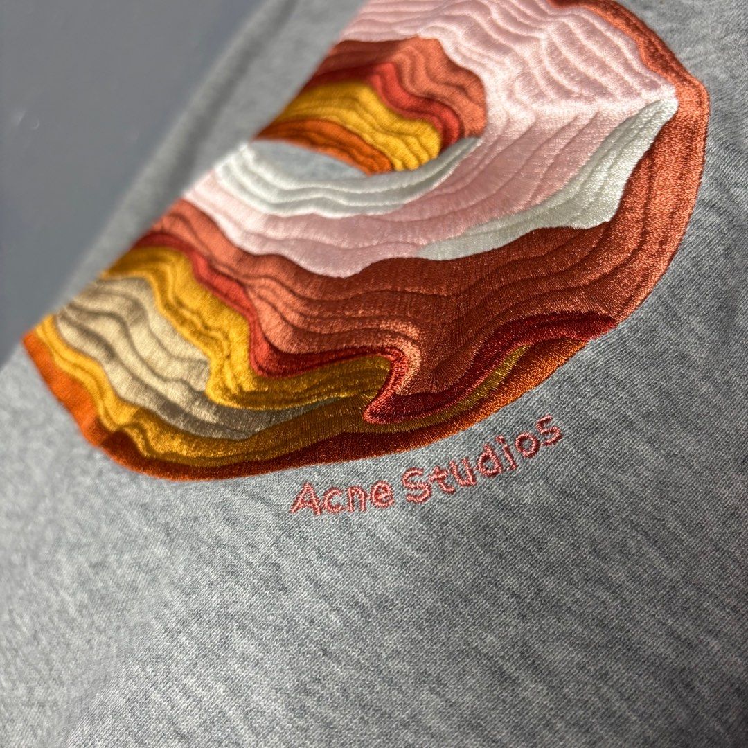 Acne Studios Embroid Donut Design Crewneck Sweater (Category: Coats, Jackets and Outerwear) located in Mandaluyong City. Submitted by fellas_ph (Listing ID 1384543023, Image 3). Description: Excellent condition No issues Size XL on tag 22" Width 27" Length .