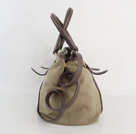 Authentic Prada Crossbody (Preloved) (Category: Luxury Bags & Wallets) located in Davao. Submitted by lilayc (Listing ID 1384459005, Image 2). Description: Selling this authentic Prada crossbody bag, in signature jacquard fabric with refined leather accents. This is perfect for everyday wear or travel. As a preloved piece, it shows light, natural signs of use, but remains in good condition with no major flaws. This was recently dry cleaned and em