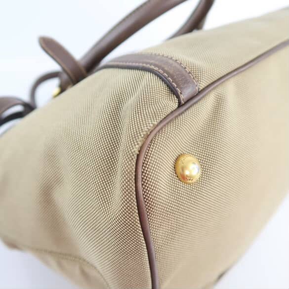 Authentic Prada Crossbody (Preloved) (Category: Luxury Bags & Wallets) located in Davao. Submitted by lilayc (Listing ID 1384459005, Image 3). Description: Selling this authentic Prada crossbody bag, in signature jacquard fabric with refined leather accents. This is perfect for everyday wear or travel. As a preloved piece, it shows light, natural signs of use, but remains in good condition with no major flaws. This was recently dry cleaned and em
