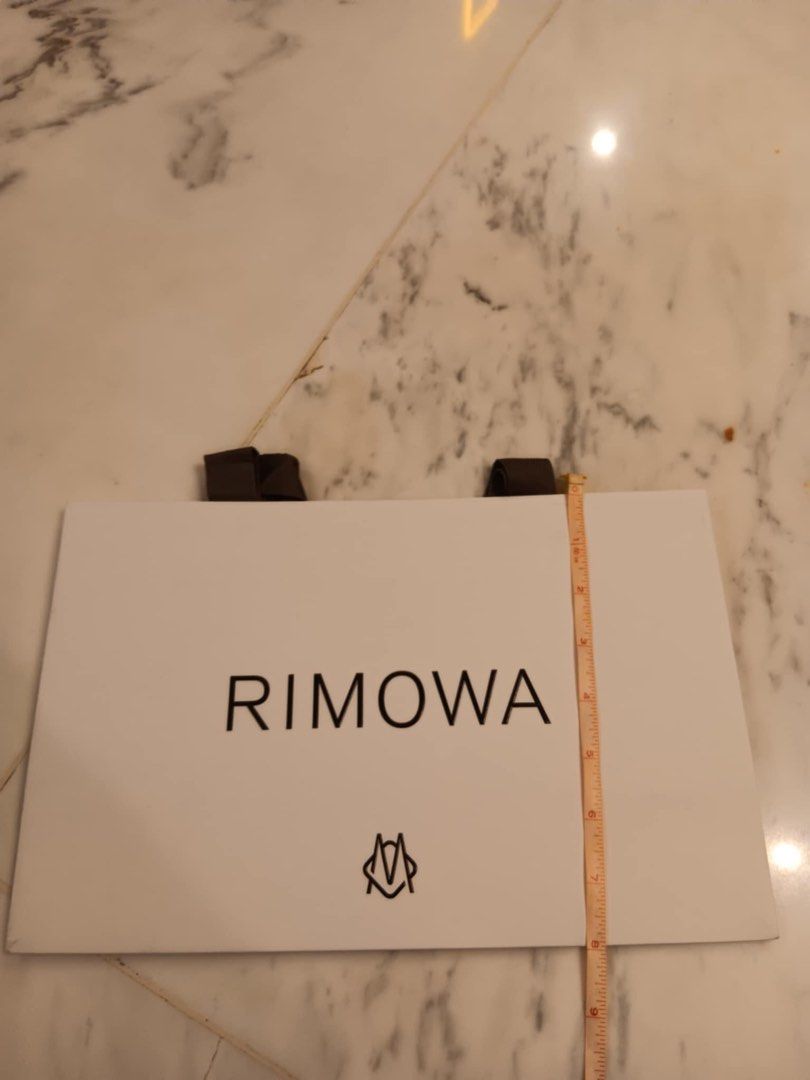 💯authentic Rimowa paperbag (Category: Luxury Bags & Wallets) located in Quezon City. Submitted by outlet18 (Listing ID 1384532847, Image 2). Description: perfect for small accessories wallet sling bag .