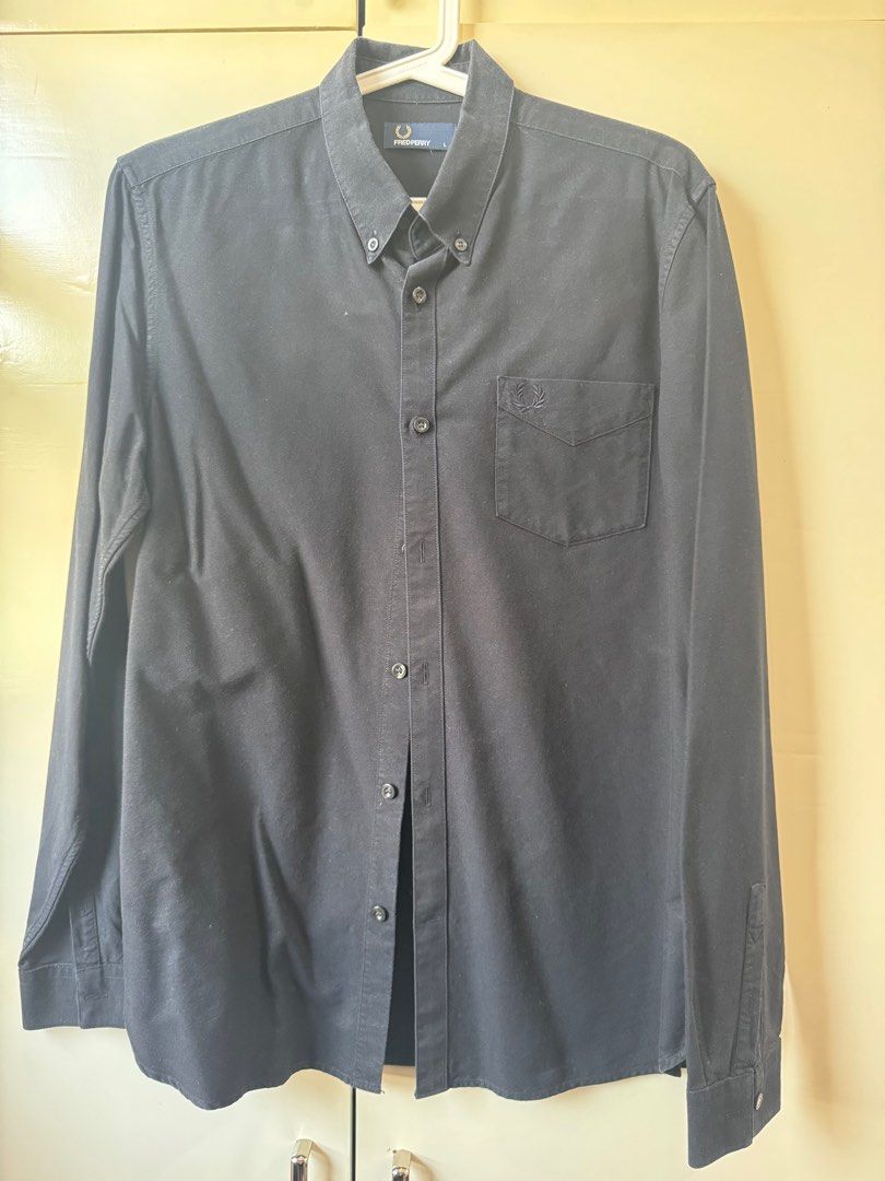 FRED PERRY BLACK LONGSLEEVES AUTHENTIC (Category: Formal Shirts) located in Muntinlupa City. Submitted by king_declutter (Listing ID 1384440301, Image 1). Description: For sale: Authentic Fred Perry Longsleeves Color: Black Size: Large Condition: 9/10 or better RFS: Decluttering This is part of my personal clothes.. purchased bnew, not ukay ukay .