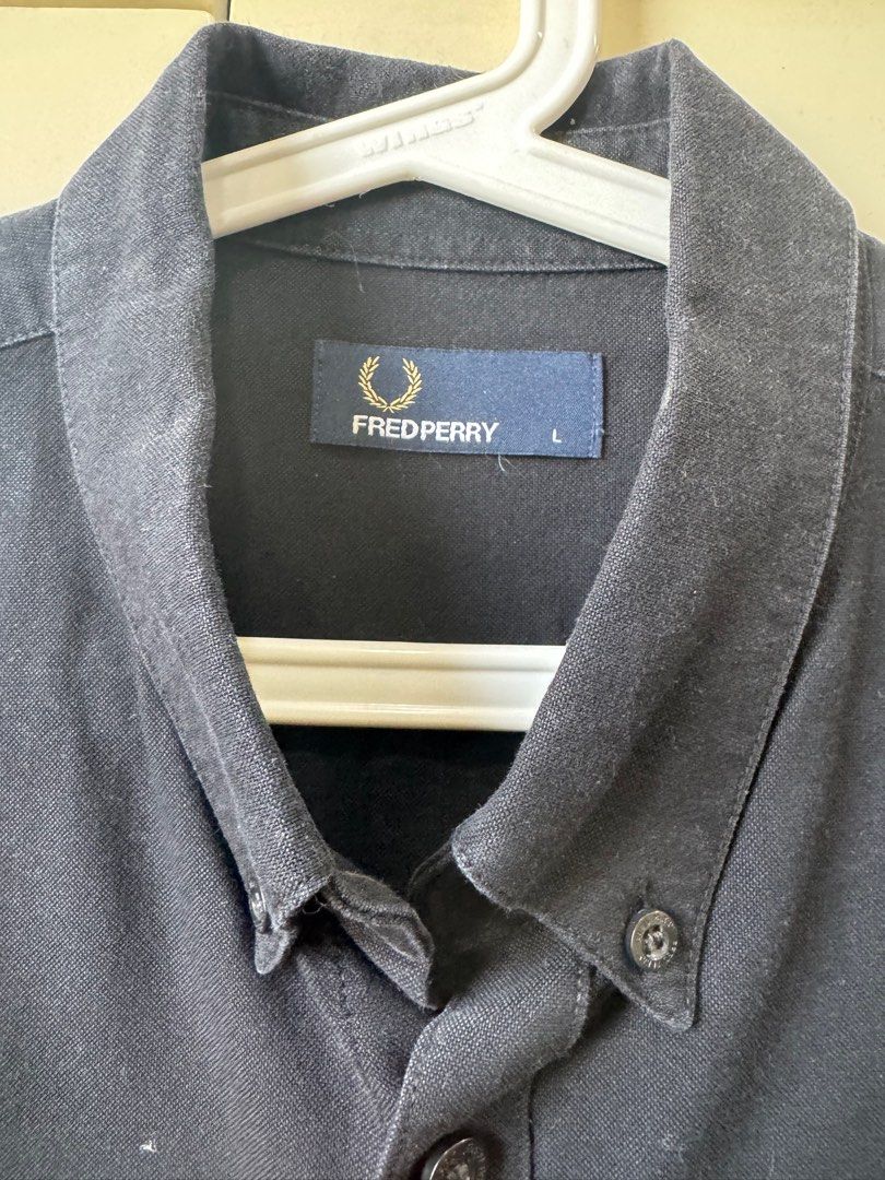 FRED PERRY BLACK LONGSLEEVES AUTHENTIC (Category: Formal Shirts) located in Muntinlupa City. Submitted by king_declutter (Listing ID 1384440301, Image 3). Description: For sale: Authentic Fred Perry Longsleeves Color: Black Size: Large Condition: 9/10 or better RFS: Decluttering This is part of my personal clothes.. purchased bnew, not ukay ukay .