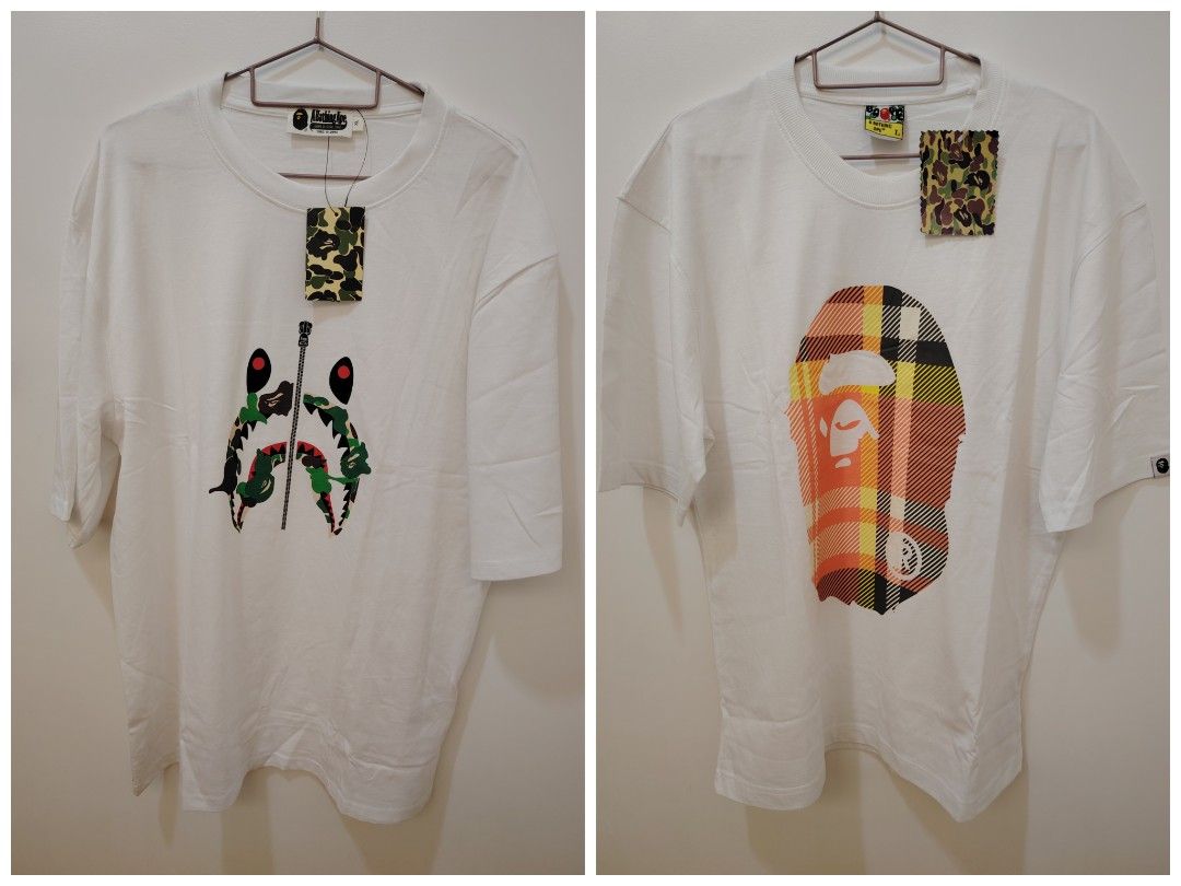 Graphic Tshirts (ABATHING APE & STUSSY) (Category: Activewear) located in San Juan City. Submitted by lavishchicks (Listing ID 1384624495, Image 1). Description: A Bathing Ape and Stussy Tshirt Large and Xl PHP450.