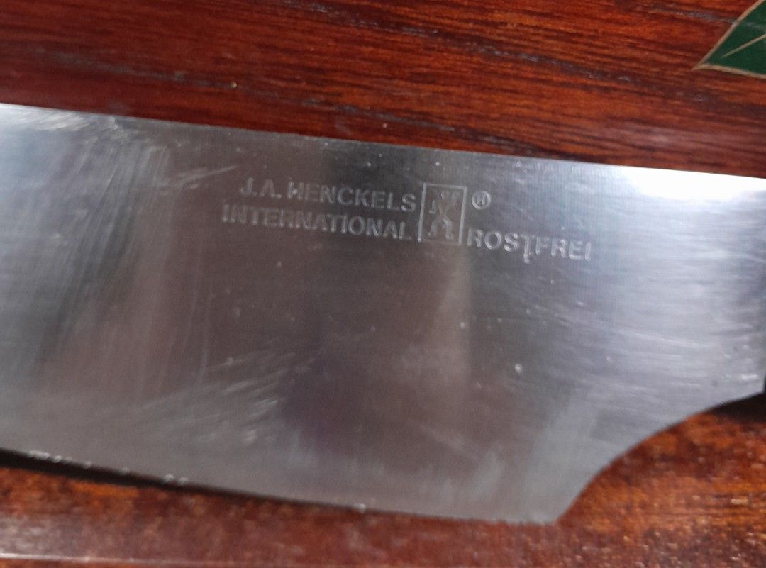 J.A. Henckels Kitchen Knife 12 inches (Category: Knives & Chopping Boards) located in Las Pinas. Submitted by 84vintage (Listing ID 1384506540, Image 3). Description: 7 inch Blade Authentic JA henckels Rostfrei Kitchen Knife. still sharp but you can have is sharpened professionally for the best performance. used and sold As Is Where Is. Actual photos posted. Please examine them carefully as they are part of the description. --📌 MUST READ Before 