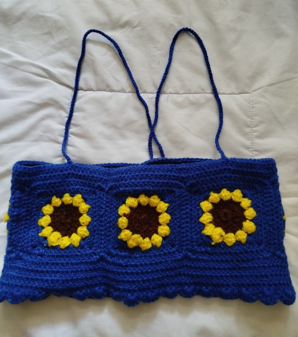 Kath's sunflower crochet top (Category: Others Tops) located in Antipolo. Submitted by _mtoc7 (Listing ID 1384454506, Image 1). Description: Handmade 💙 Brandnew! ✨ Fits ALL SIZES (Small to Plus Sizes) Crisscross tie on the back (adjustable to your preference) 🙂 Very detailed, makapal, matibay 💙 Lalamove ready or SF via J&T add+ (70 MM, 90 Province). Loc: Antipolo.