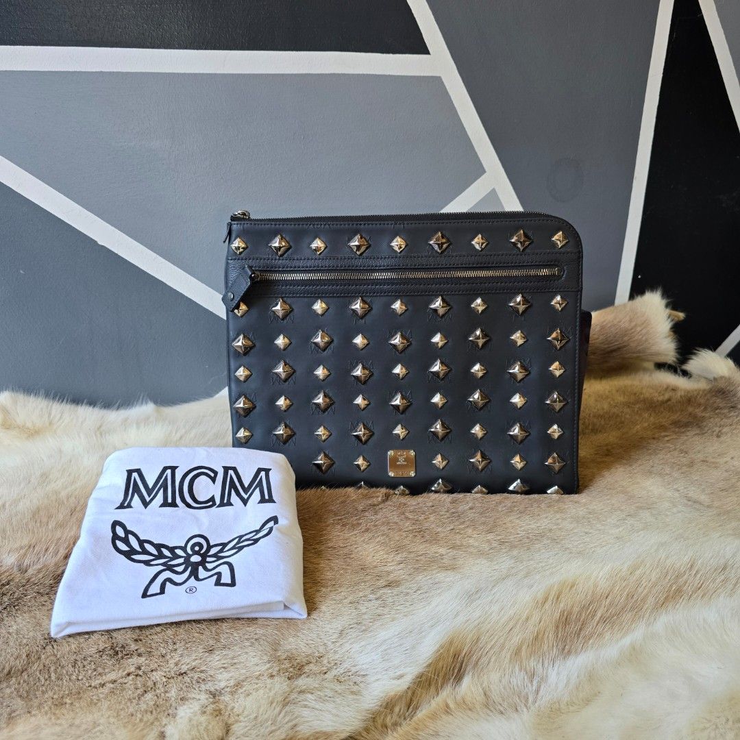 Limited edition MCM studed clutch (Category: Luxury Bags & Wallets) located in Manila. Submitted by arvinaboab04229 (Listing ID 1384543326, Image 1). Description: preloved item super nice in actual.
