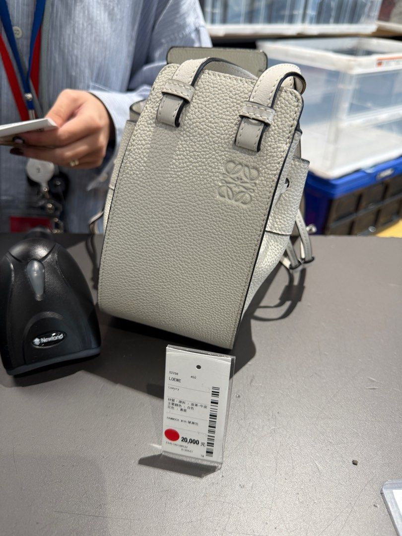 LOEWE WHITE MINI HAMMOCK (Category: Luxury Bags & Wallets) located in Quezon City. Submitted by yth.ph (Listing ID 1384564728, Image 1). Description: Got it for 20,000 NTD from Second Street Taipei (38k php) Original with entrupy Bag, dust bag, and entrupy only Please manage expectations as this is preloved.