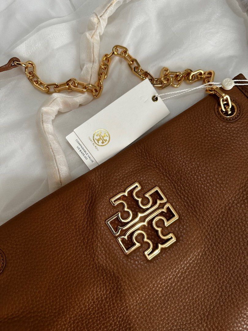 Tory Burch Britten Swingpack Bag (Category: Luxury Bags & Wallets) located in Angeles City. Submitted by lancecamino (Listing ID 1384532099, Image 2). Description: Tory Burch Britten Swingpack Bag Can use two way Shoulder Bag or Sling Bag.