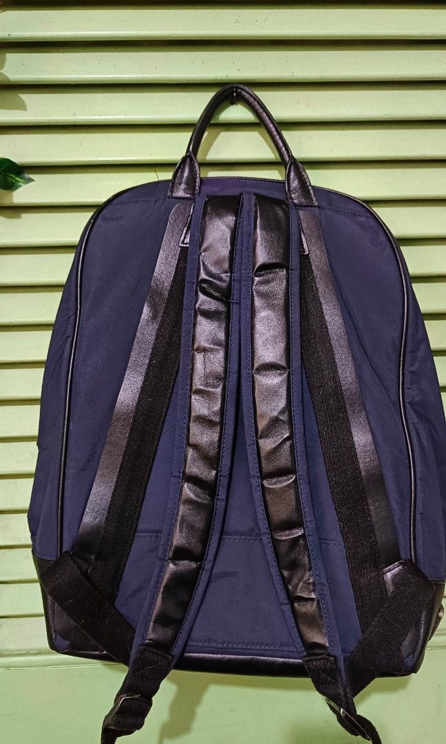 TUMI HAYDON STANFORD BACKPACK (Category: Backpacks) located in Hermosa. Submitted by meowmingZ (Listing ID 1384496453, Image 3). Description: AUTHENTIC Color: Navy Blue Used only once and was stored eversince. Padded/adjustable back straps, Zip entry to main compartment, Leather carry handle, 1 front U-zip pocket, 1 front straight zip pocket, 1 back slip pocket with magnetic closure 2 zip pockets, 2 open pockets, 1 iPad compartment, 15 laptop poc