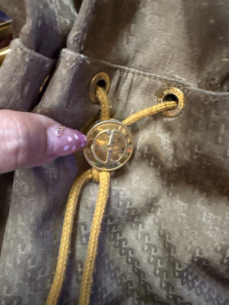 Vintage Gucci bucket bag (Category: Luxury Bags & Wallets) located in Paranaque City. Submitted by shopofashopaholic (Listing ID 1384447148, Image 2). Description: Authentic vintage Gucci bag Strap worn out but fat from maputol. All hardware gold na gold pa except the big one in front which can be cleaned by metal polish. .