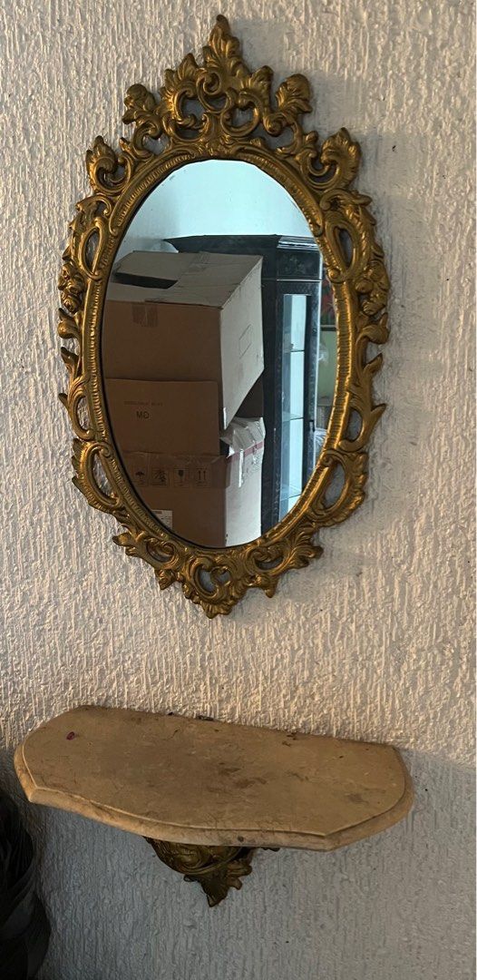 Wall mirror with table (Category: Mirrors) located in Marikina City. Submitted by crewstuff (Listing ID 1384582546, Image 1). Description: Vintage mirror with table made of metal.