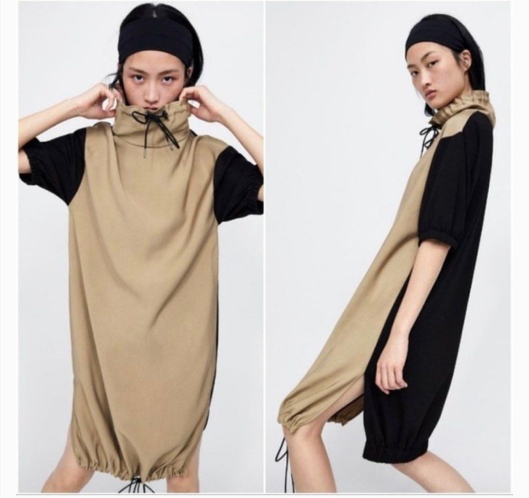 ZARA Colorblock Drawstring Dress (Category: Dresses) located in Marikina City. Submitted by kimkawaii (Listing ID 1384504905, Image 1). Description: RFS: declutter Authentic Zara Bought it in a thrift store in Dubai Size: S (can fit up to size M) Two Toned Dress (Black/Tan) Drawstring at bottom and at neck Slits on sides Cowl neck Fabric: Polyester, elastane Super unique design Issue: drawstring at the bottom was cut and the drawstring cord stopp