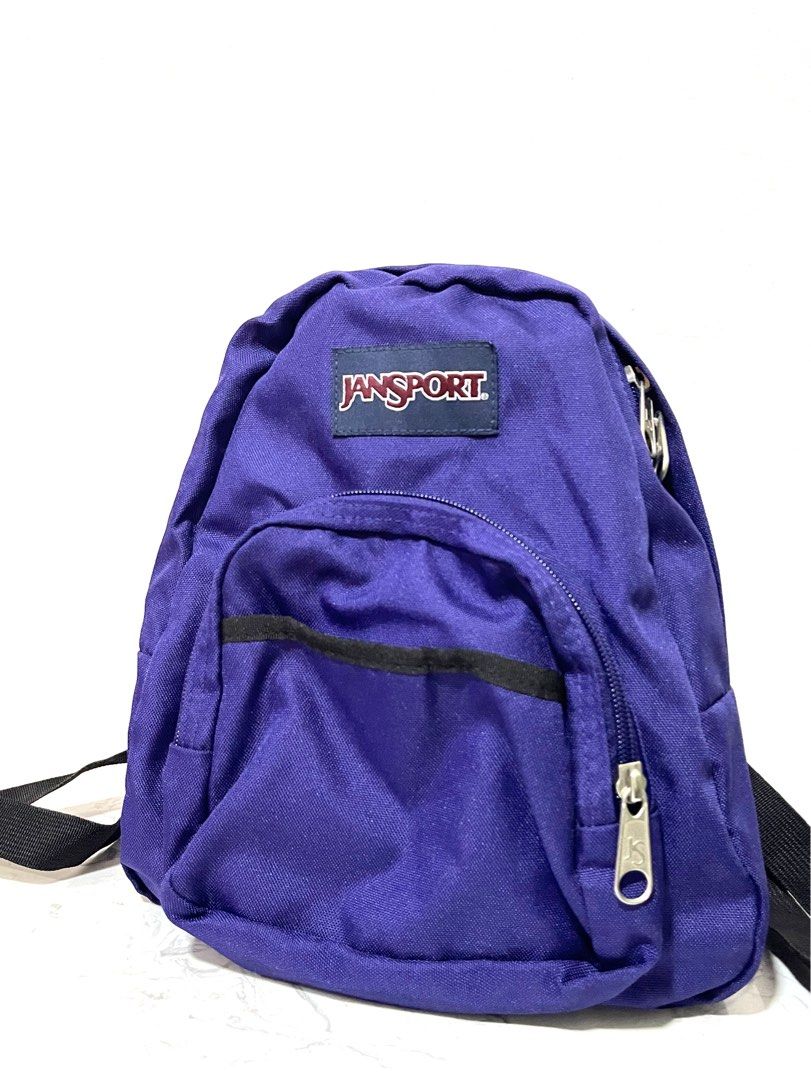 Authentic Jansport Half Pint Mini Backpack in Purple 💯 (Category: Backpacks) located in Quezon City. Submitted by declutterbybd (Listing ID 1389827840, Image 2). Description: 100% Authentic Guaranteed. Used 2x only (Big markdown LP, need to declutter) Item Details * Size msrmt — Height 11.2” x Width 9.8” x depth 4.1” (bag capacity 10.2L) * Color - Dark Purple /Violet * Water resistant * Condition: Good as new. Used only twice. Stored-well so the