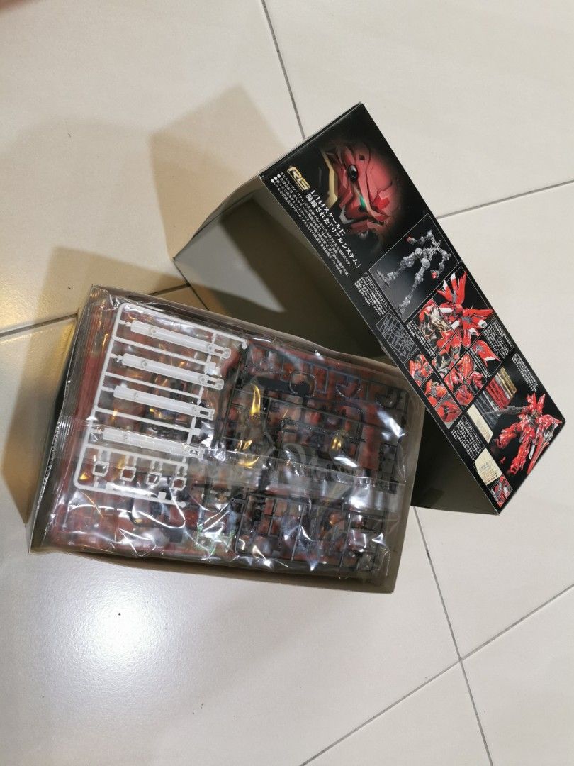 Bandai RG 1/144 Sinanju Gundam Model Kit (Category: Gundam Model Kits) located in Singapore. Submitted by qq7776 (Listing ID 1389737673, Image 2). Description: - Brand new, unopened Bandai Real Grade 1/144 Sazabi model kit. - Box is in good condition with a bit of dented at corner - Perfect for Gundam enthusiasts and model kit builders. - Ready to assemble and customize. - Includes all original parts and instructions..