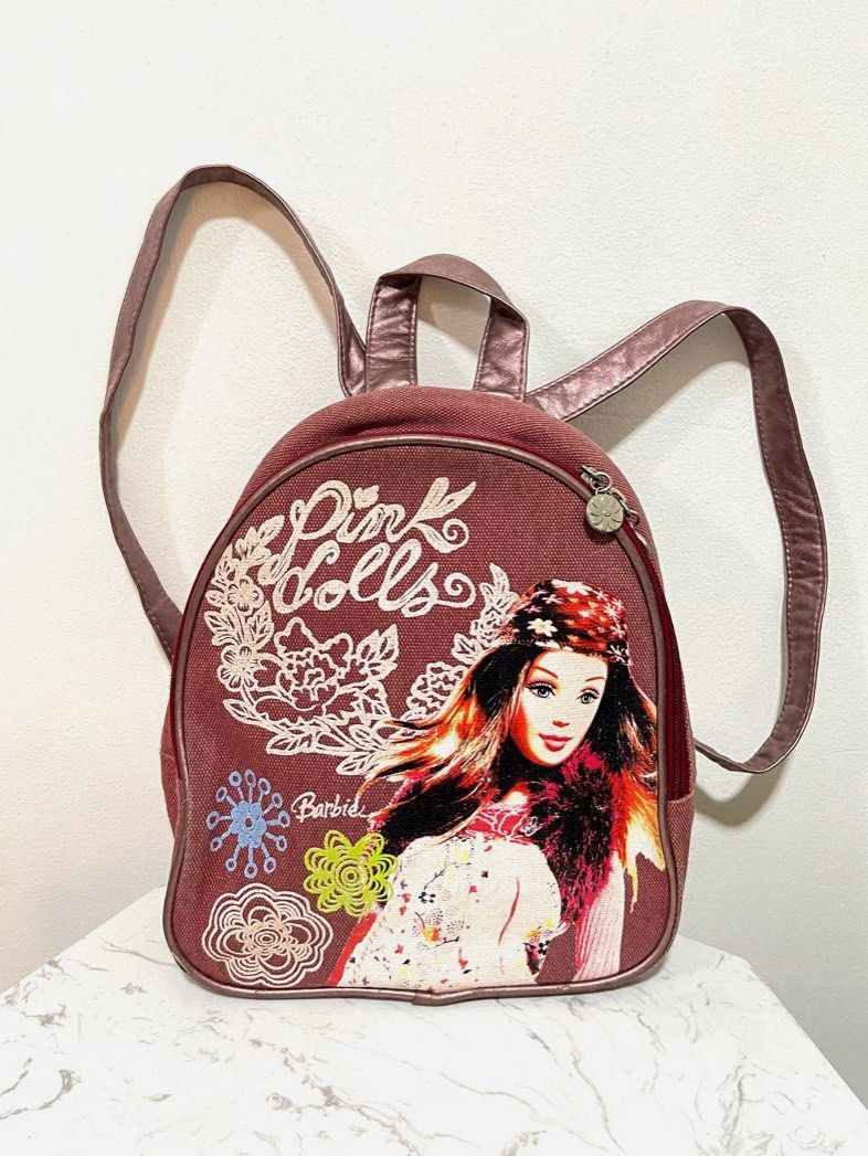 Barbie Mini Backpack in Denim Maroon (Original) 💯 (Category: Backpacks) located in Quezon City. Submitted by declutterbybd (Listing ID 1389834688, Image 1). Description: 100% Authentic Guaranteed — Pre-loved (Big markdown, need to declutter) Item Details * Size - Mini/Small * Color - Denim Red / Maroon * Condition: Lightly used. There’s a slight sign of usage but overall still in good condition. No major damage/stain. Stored-well in closet. *Aju