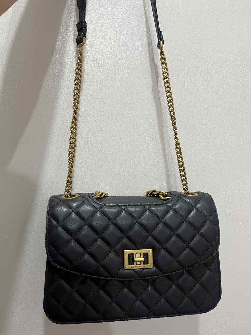 Charles and Keith Bag (Category: Luxury Bags & Wallets) located in Cebu City. Submitted by nkzone (Listing ID 1389759120, Image 2). Description: Charles and Keith black sling bag Rarely used Original price almost 5k.