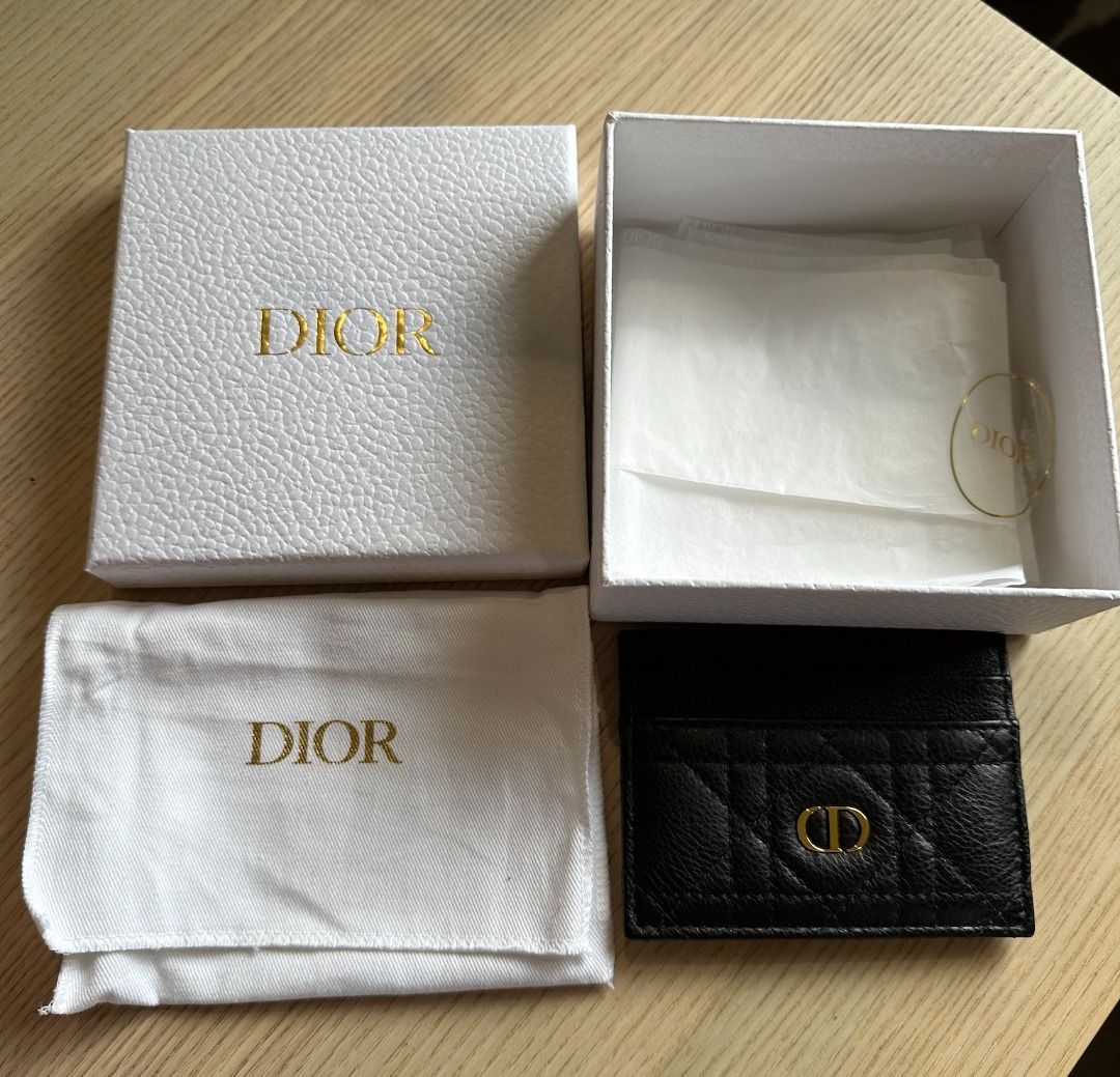 Dior Card Holder Black Calfskin (Category: Wallets & Card holders) located in Paranaque City. Submitted by lioraverse (Listing ID 1389723221, Image 3). Description: Timeless Dior elegance in a compact form — the Caro Freesia card holder in black supple calfskin with signature Cannage stitching. Slim yet functional with 5 card slots. PHP 19,000 (Retail: PHP 23,500) Authentic, purchased from Dior Used once, excellent condition Includes dust bag, pa