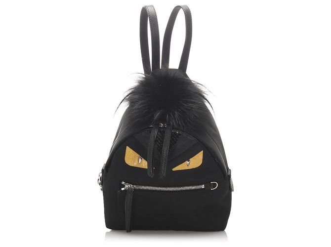 Fendi Black Medium Monster Backpack Yellow (Category: Luxury Bags & Wallets) located in Manila. Submitted by street_wear (Listing ID 1389756532, Image 1). Description: Fendi Black Medium Monster Backpack Yellow Lightly Used 8.5/10.