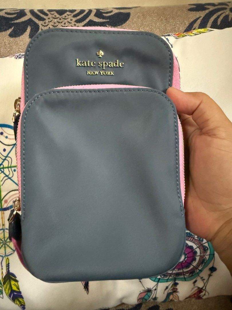 FREE SF Original Kate Spade CP Holder Sling (Category: Cross-body Bags) located in Lucena. Submitted by sgp1013 (Listing ID 1389846396, Image 3). Description: Only used once Still looks brand new, no tags Guaranteed original or your money back RFS: too many bags, result of impulse buying FIXED PRICE, this is already a good deal.